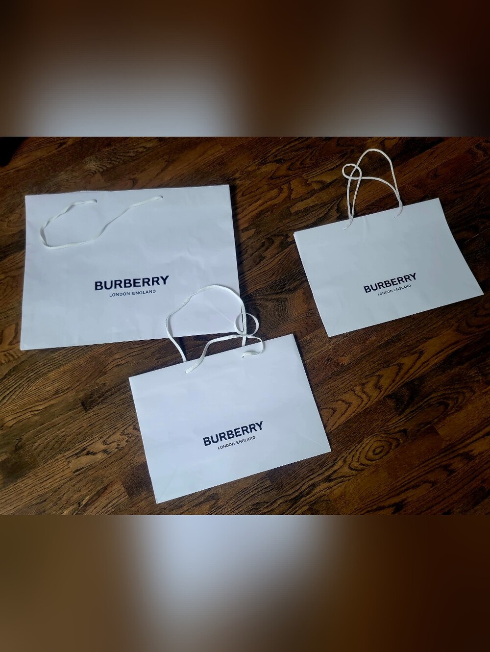 Burberry White Shopping Bags Various Sizes.